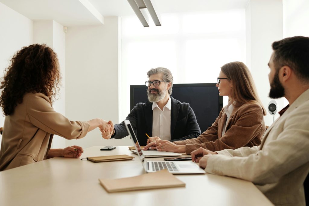 Human resource congratulating an applicant